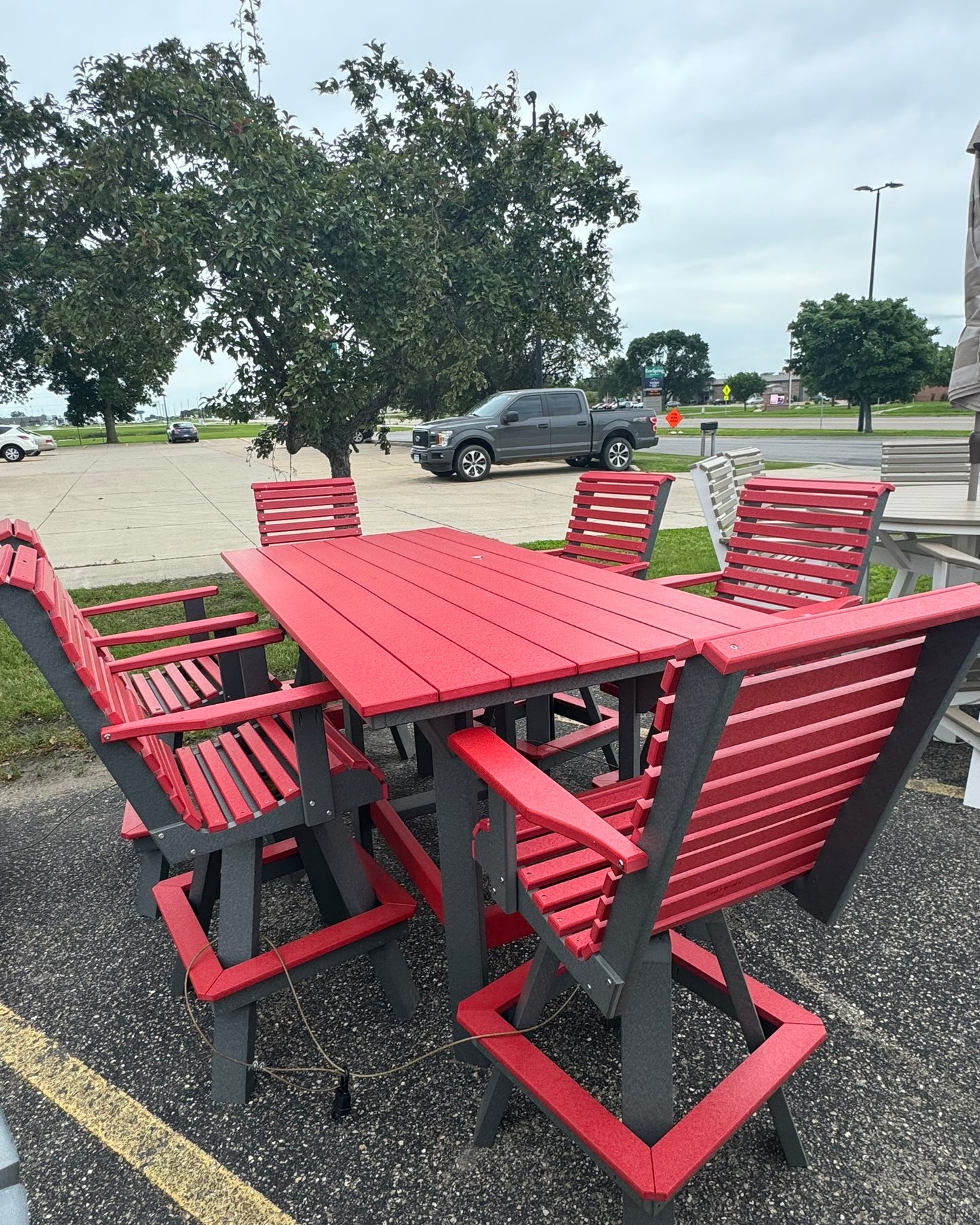 7' Bar Table with 6 Rollback Swivel Bar Chairs in Dark Gray and Cardinal