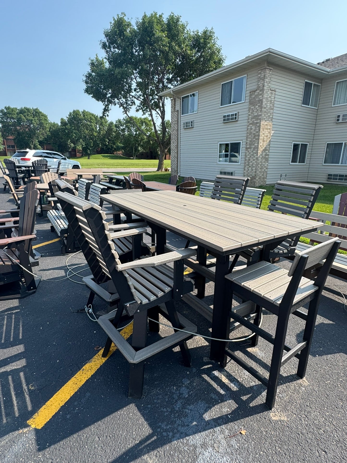 7' Bar Table with 4 Rollback Chairs and 2 stationary chairs in Black and Coastal Gray